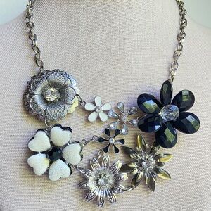 Black and white floral bib statement necklace in lightweight silvertone metal